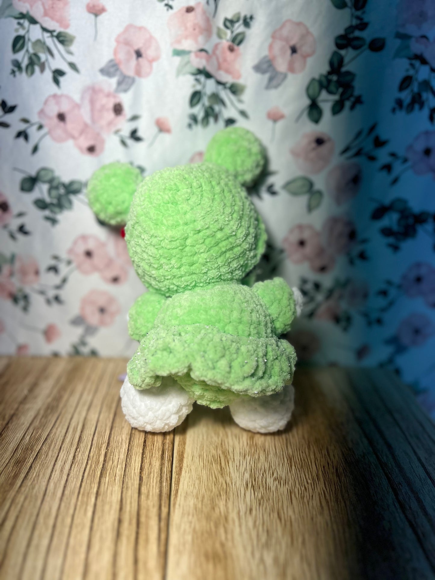 Crochet hello kitty in a frog outfit