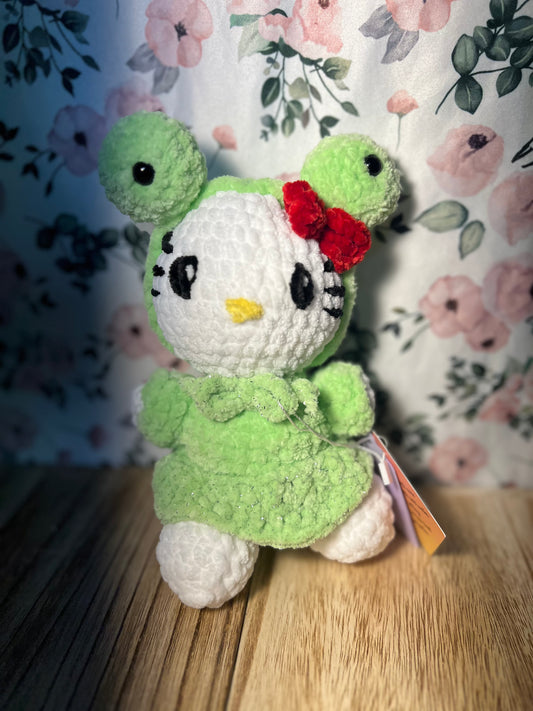 Crochet hello kitty in a frog outfit